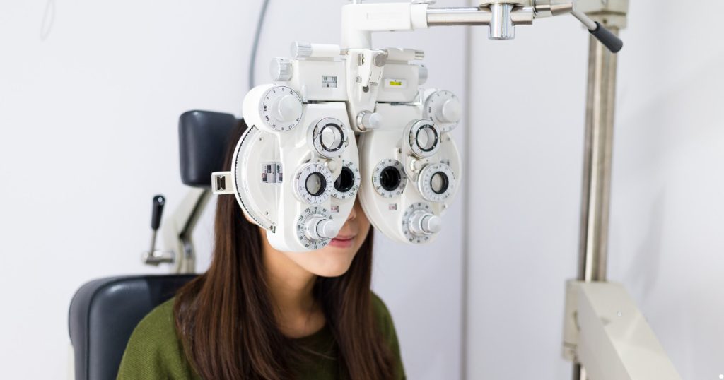 Woman doing eye test.