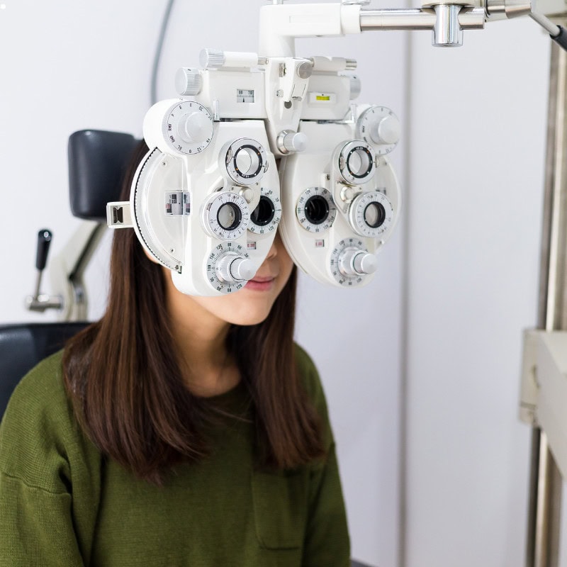Woman doing eye test.